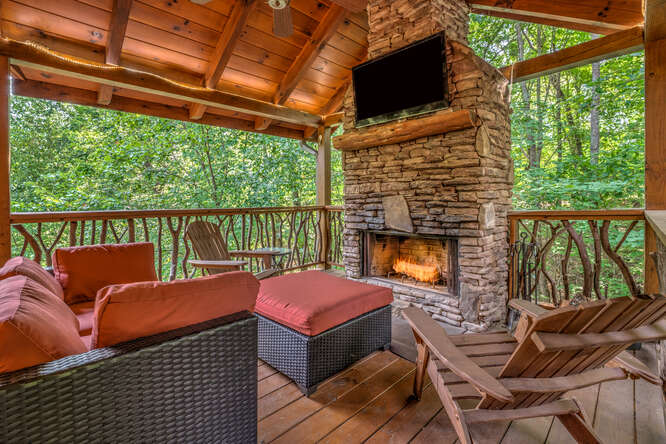 Fireplace in the back of Blake's on the Creek Cabin to relax.